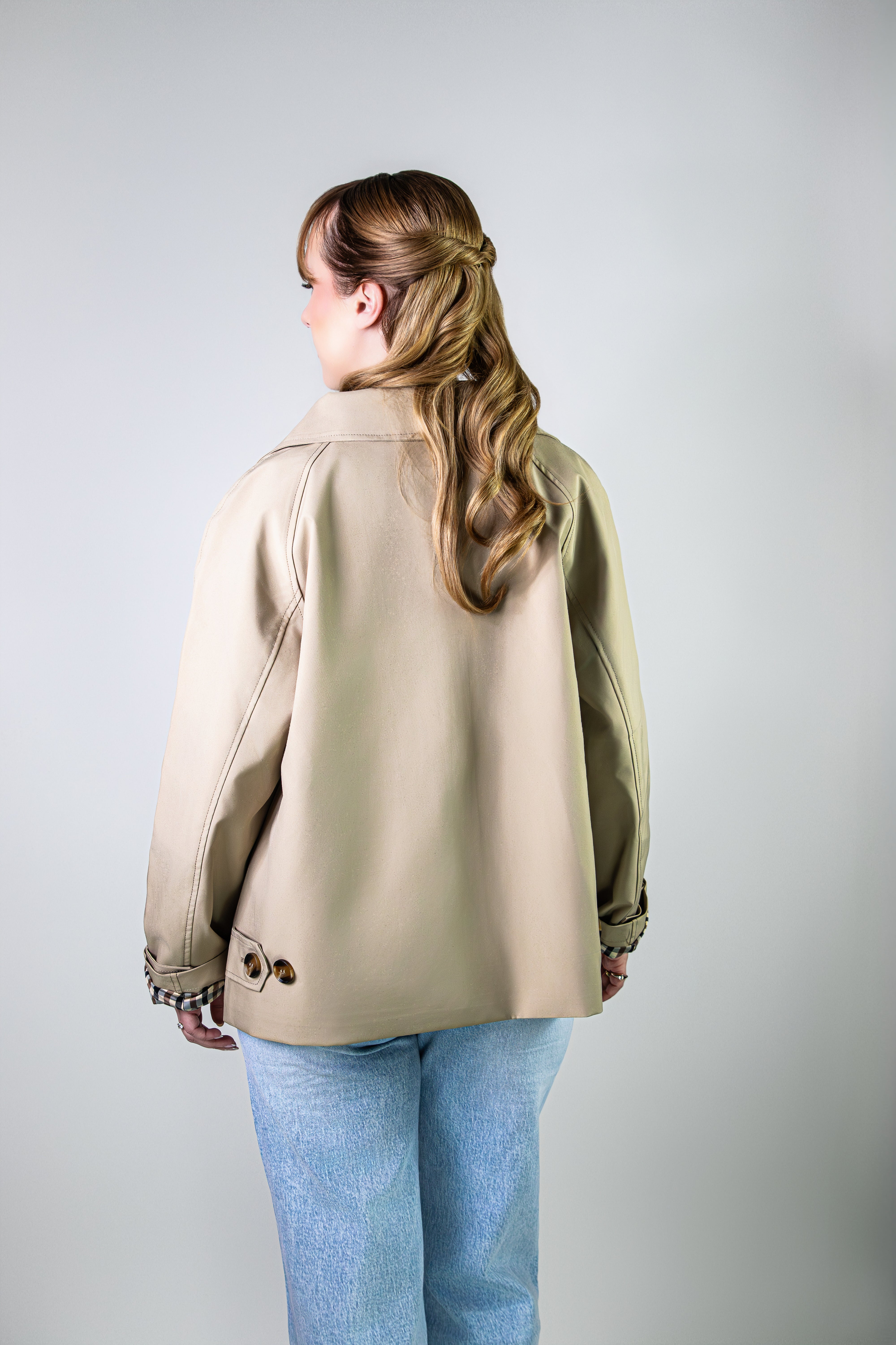 Veste élégante en beige avec doublure à carreaux
